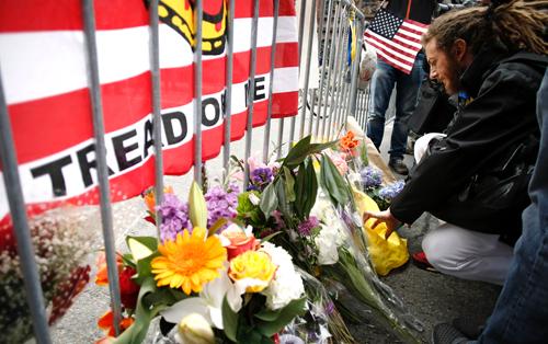 Flowers were placed at the site of the Boston Marathon to pay respect to those effected by the bombings on Tuesday April 16, 2013. Three people have died as a result of the bombings and over 170 have been reported as injured. 