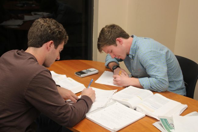 First years John Hudgens (left) and Sam Baker (right) study for an exam in Fondren Library. 