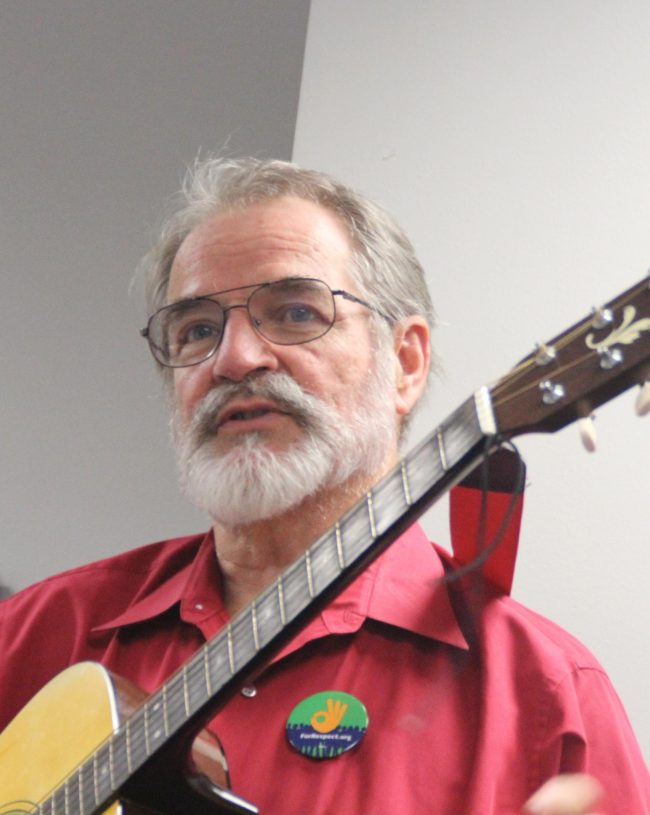 Labor activist Gene Lantz performs a musical history lesson on May Day.