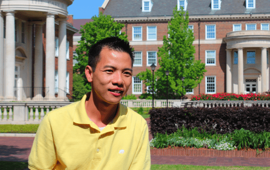 Senior Michael Tran stands outside of SMUs Cox Business School.