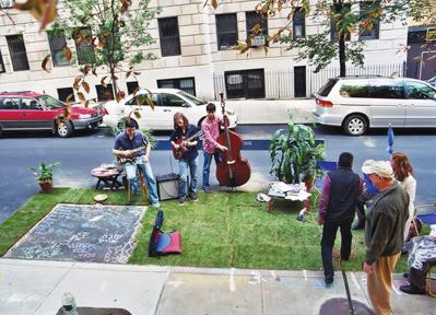 A band plays in one of the “Mini-Parks” set up in downtown on Friday. (Courtesy of GAtech.edu)