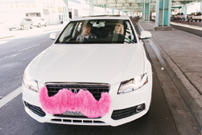 Lyft’s cars are adorned with a signature pink mustache on their grill. (Courtesy of Paige Thelen)