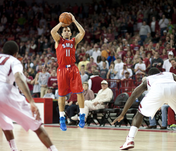 SMUs Nic Moore (11) shoots a basket during the second half of an NCAA college basketball game in Fayetteville, Ark., Monday, Nov. 18, 2013. Arkansas won 89-78. (AP Photo/Sarah Bentham)