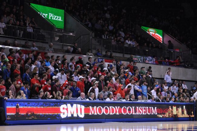 The student section, otherwise know as “The Mob,” is filled with Mustang fans watching basketball in the newly renovated Moody Coliseum.Photo credit: Ryan Miller