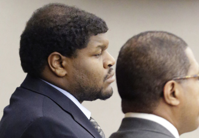 Josh Brent (left) listens while the sentence for his intoxication manslaughter conviction is read in court. (Courtesy of AP)