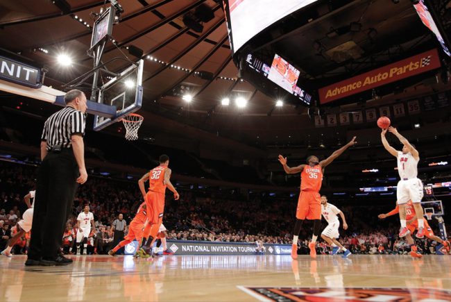 SMUs Nic Moore (11) shoots over Clemsons Landry Nnoko (35) during the first half of an NCAA college basketball game in the semifinals of the NIT Tuesday, April 1, 2014, in New York. (AP Photo/Frank Franklin II)