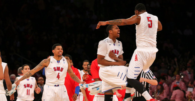 Apr 1, 2014; New York, NY, USA; Southern Methodist Mustangs guard Sterling Brown (3) and forward Markus Kennedy (5) celebrate with their teammates in the final minutes against Clemson Tigers during the second half at Madison Square Garden. Mandatory Credit: Adam Hunger-USA TODAY Sports