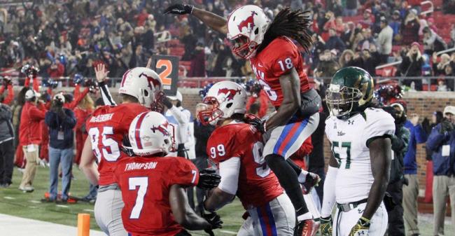 November 15, 2014; Dallas, TX, The SMU Mustangs celebrate a touchdown by defensive end Justin Lawler #99 against the USF Bulls at Ford Stadium.  Photo by Vladimir Cherry