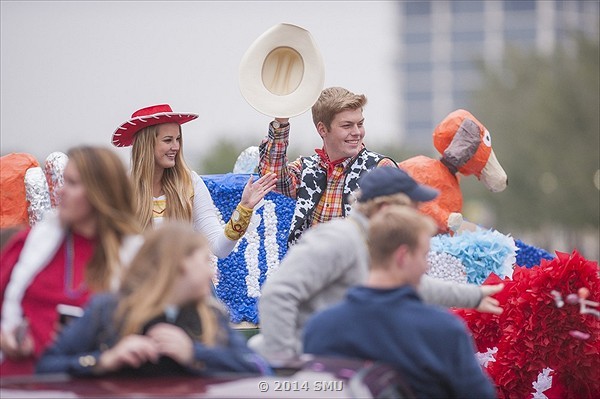 Queen and King candidates riding on floats in the Homecoming Parade (Courtesy of SMU)