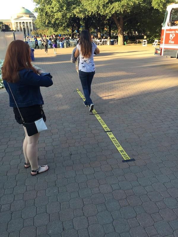 Students attempt to walk a straight like wearing drunk goggles Photo credit: Katarina Zito