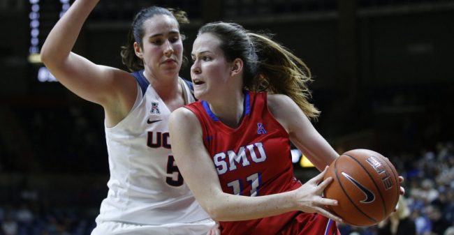 Feb 24, 2016; Storrs, CT, USA; Southern Methodist Mustangs forward Keely Froling (11) drives the ball against Connecticut Huskies center Natalie Butler (51) in the second half at Gampel Pavilion. UConn defeated SMU 88-41. Mandatory Credit: David Butler II-USA TODAY Sports