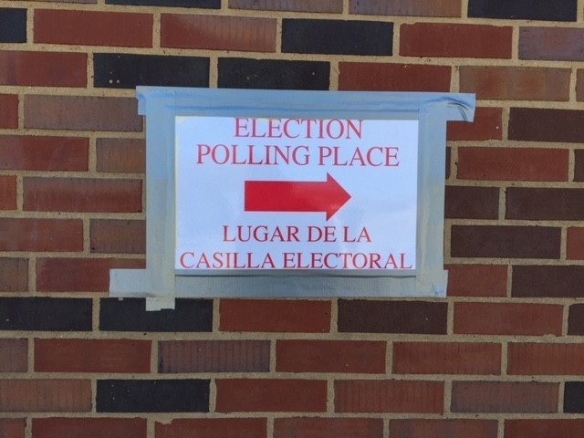 Signs pointing to the Grenada Ave. polling place. Photo credit: Bridget Graf