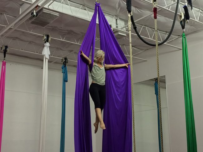 Founder Fanny Kerwich climbs to the top of a silk. Photo credit: Jacquelyn Elias