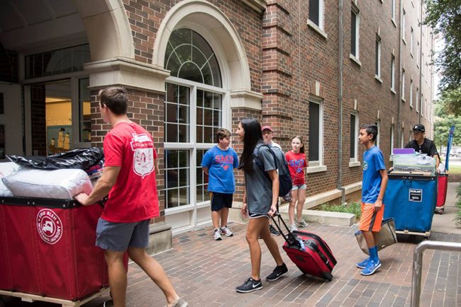 Students move-in before taking off for Corral.