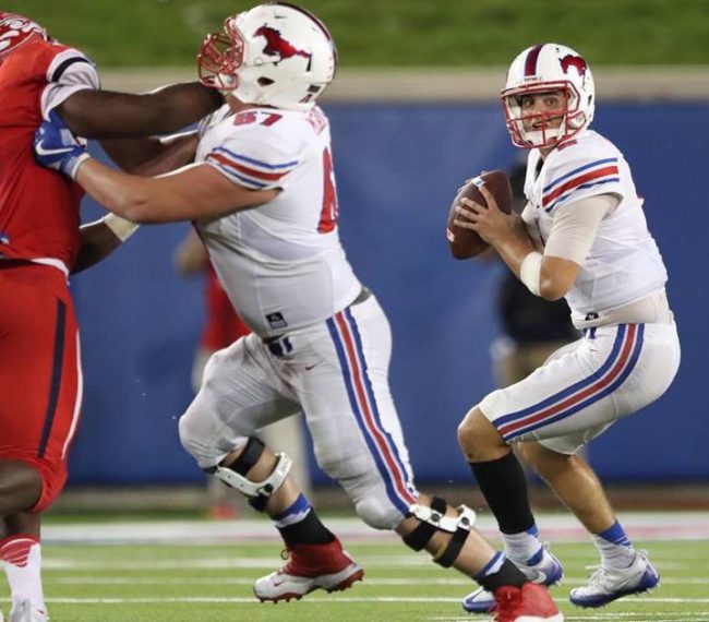 SMU quarterback Ben Hicks (right) drops back to pass in SMUs win vs. Liberty on Sept. 17, 2016. (Photo credit: SMU Football on Facebook).
