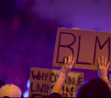Black Lives Matter protestor with sign Photo credit: Getty Images