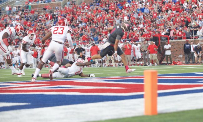 SMU quarterback Ben Hicks (8) scores on a 1-yard touchdown in his teams Oct. 22 win vs. Houston at Ford Stadium. Photo credit: Chris Coyne