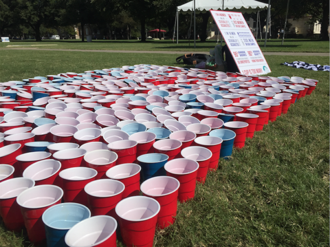 These red and blue cups represent sexual assault victims on college campuses. Photo credit: Kara Fellows