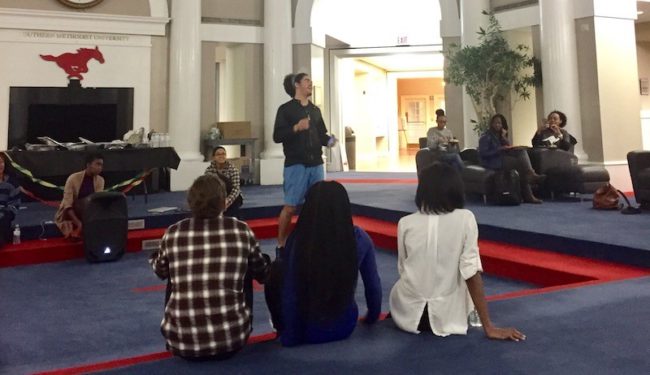 SMU Theatre student Curtis Faulkner performs for the crowd gathered at the Atrium. Photo credit: Lili Johnston