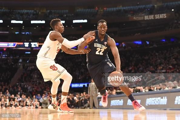 Akoy Agau drives to the hoop in the Big East Tournament.