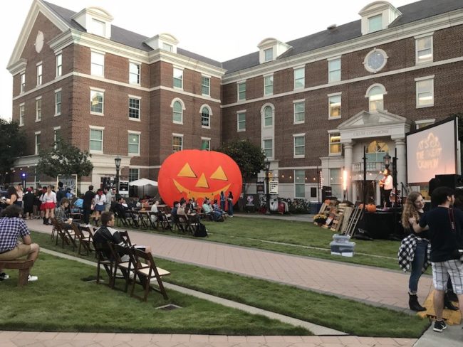 A giant pumpkin sits in front of Crum Commons for the Great Crumpkin Festival. Photo credit: Doreen Qin