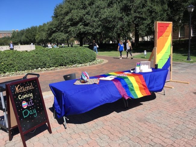This was the table at the flag pole for National Coming Out Day. Per the request of the shift volunteer, they have not been photographed here. Throughout the day, one to two volunteers were tabling. Photo credit: Nusaiba Mizan