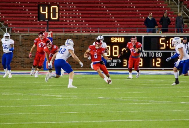 Ben Hicks scrambles for a first down against Tulsa in 2017. Photo credit: Shelby Stanfield