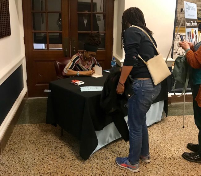 Nnedi+Okorafor+signs+books+for+audience+members+following+her+keynote+address+at+Highland+Park+High+School+on+Thursday%2C+Feb.+21.+Photo+credit%3A+Maggie+Kelleher