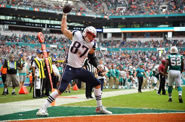 Rob Gronkowski of the New England Patriots celebrates his touchdown in the second quarter against the Miami Dolphins at Hard Rock Stadium on December 9, 2018 in Miami, Florida.  (Photo by Mark Brown/Getty Images) Photo credit: Getty Images