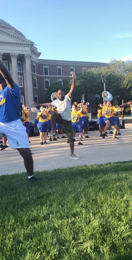 Khyree H. performing with marching band of his former high school Townview Magnet Center.jpeg