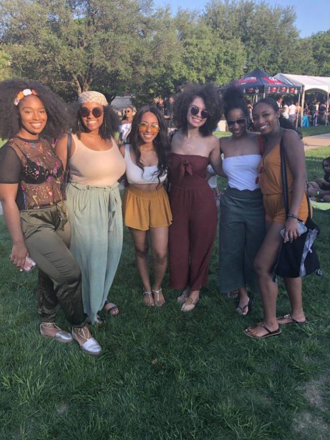 SMU students at Curlchella pose for a picture on Dallas Hall lawn Photo credit: Takia Hopson