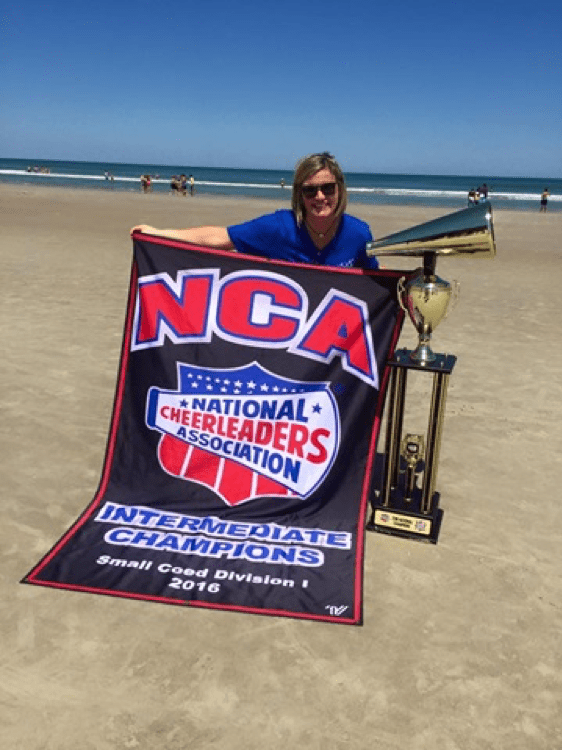 Fettinger with her 2016 National Champions trophy. Photo credit: SMU Website