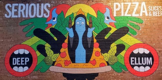 A mural inside of Serious Pizza in Deep Ellum. Photo credit: Emily Adamson