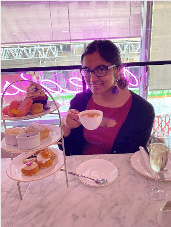 Pooja having afternoon tea in London.