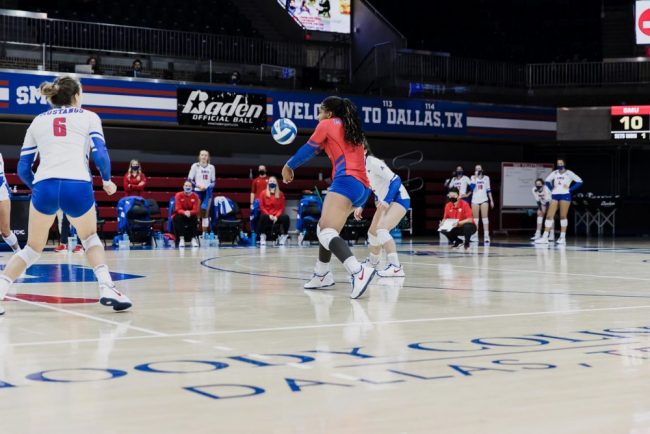 Bria Merchant receiving a hit from Houston Photo credit: SMU Athletics