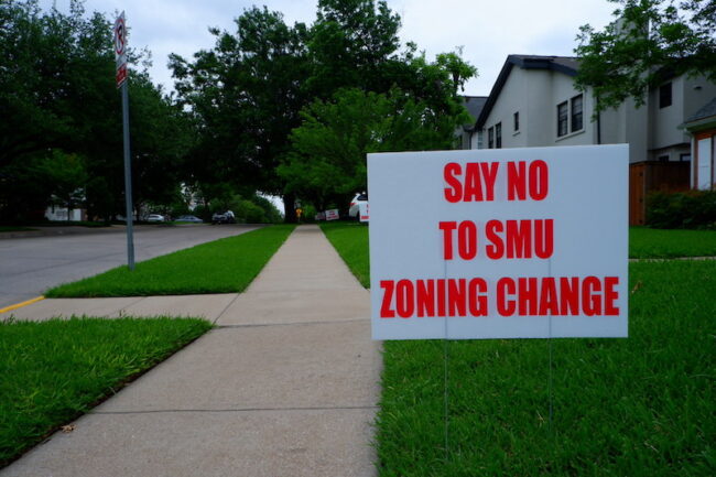 One of the many signs along University Boulevard residences protesting SMUs rezoning plans. Photo credit: Audrey McClure