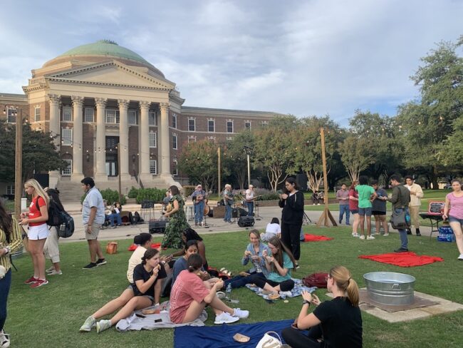 Students enjoying themselves on Dallas Hall Lawn with food and live music. Photo credit: Catie George