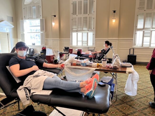 Shirmon O’Connor donating blood on campus. Photo credit: Madison Hale