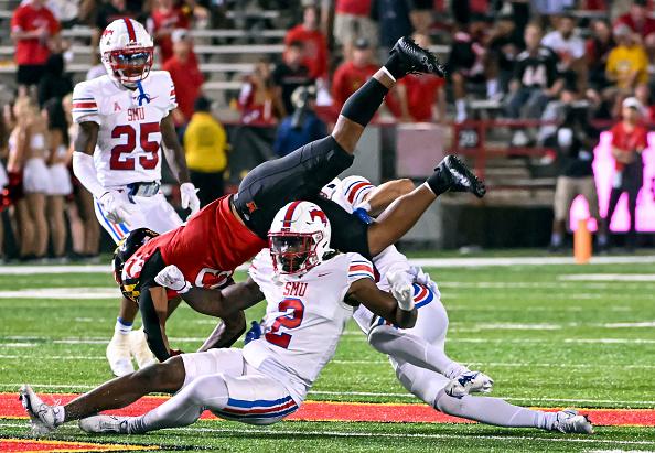 COLLEGE PARK, MD - SEPTEMBER 17: Maryland Terrapins running back Colby McDonald (23) is upended by Southern Methodist Mustangs safety Isaiah Nwokobia (2) and fumbles the ball during the SMU Mustangs game versus the Maryland Terrapins on September 17, 2022 at Capital One Field at Maryland Stadium in College Park, MD.  (Photo by Mark Goldman/Icon Sportswire via Getty Images)