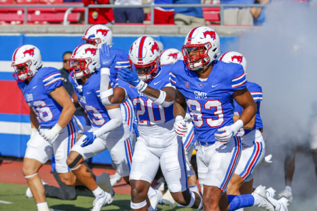 SMU players run out the tunnel before an NCAA football game at Ford Stadium on Saturday, Oct. 22, 2022 in University Park, Texas. Cincinnati defeated SMU 29-27. (Mark Reese / Photographer)
