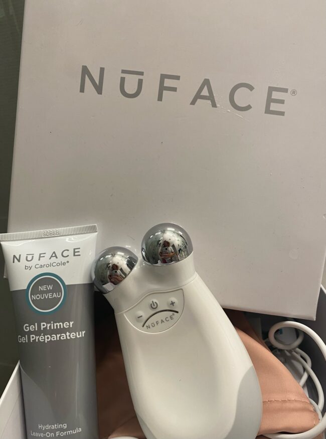 NuFace logo from box, gel primer, and facial device seen in image.