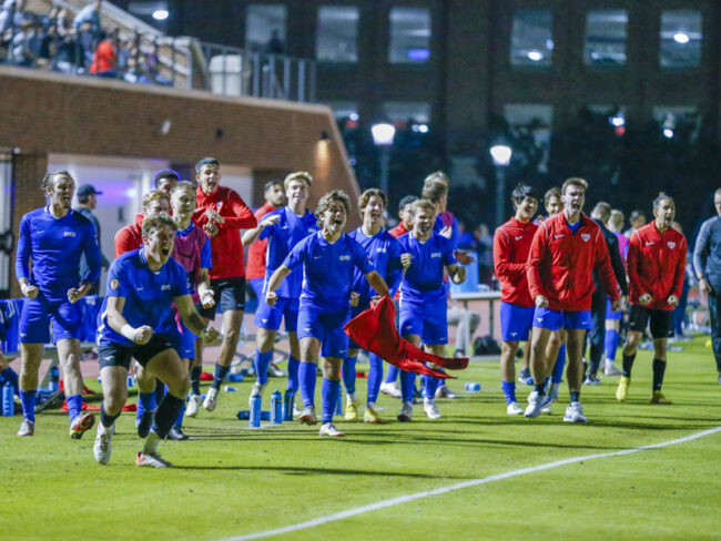 SMU+players+celebrate+on+the+sidelines+during+the+3-2+win+against+Tulsa.+Photo+credit%3A+Mark+Reese