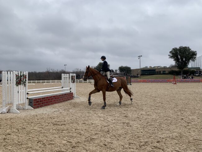 SMU student Taylor Kraft riding horse Chester during her exhibition round.