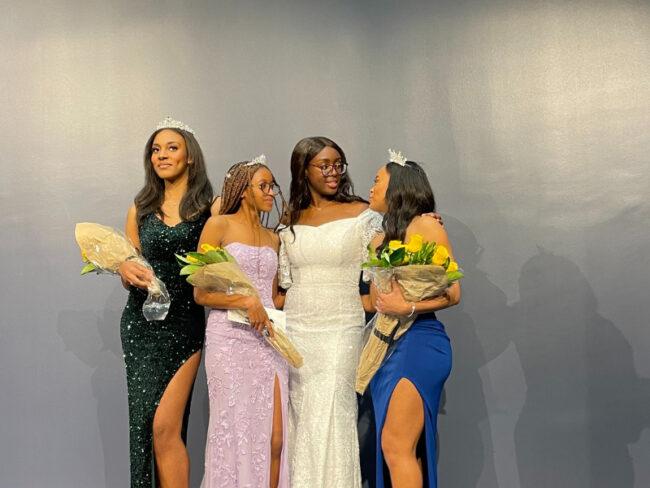 Contestants pose for photos following crowning. Photo credit: Karrington Bennett