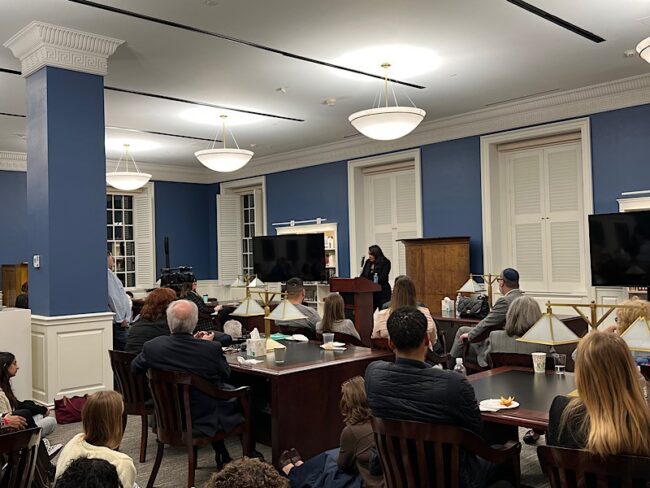 Trethewey reading her poems to SMU students and faculty in Bridwell Library