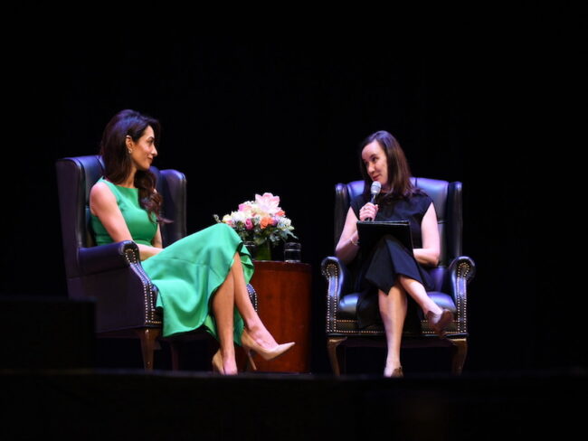 Professor+Natalie+Nanasi+speaks+to+Amal+Clooney+at+the+Louise+B.+Raggio+Lecture+Series.+Photo+credit%3A+SMU