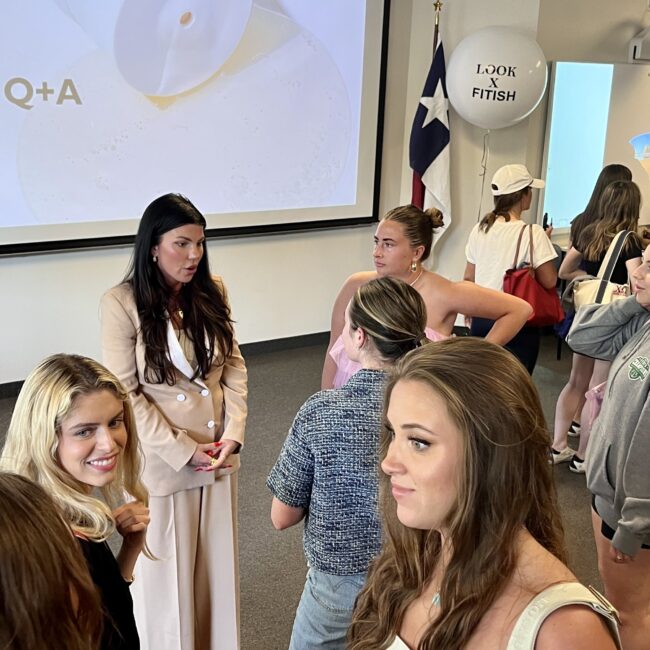 Founder of Fitish, Jenna Owens, speaks with SMU students after her lecture. Photo credit: Lauren Villarreal
