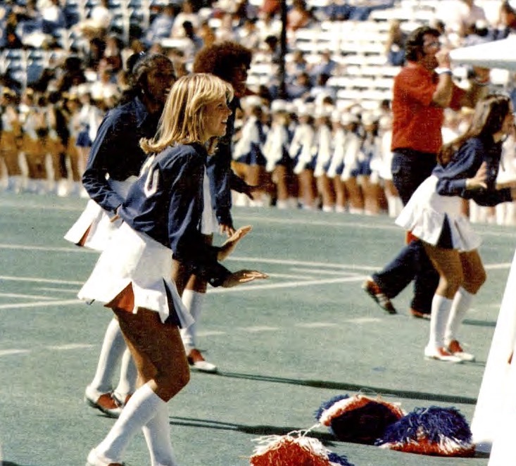 SMU cheerleaders lead the crowd at the 1975 Homecoming game against the University of Texas. Courtesy of SMU Libraries.
