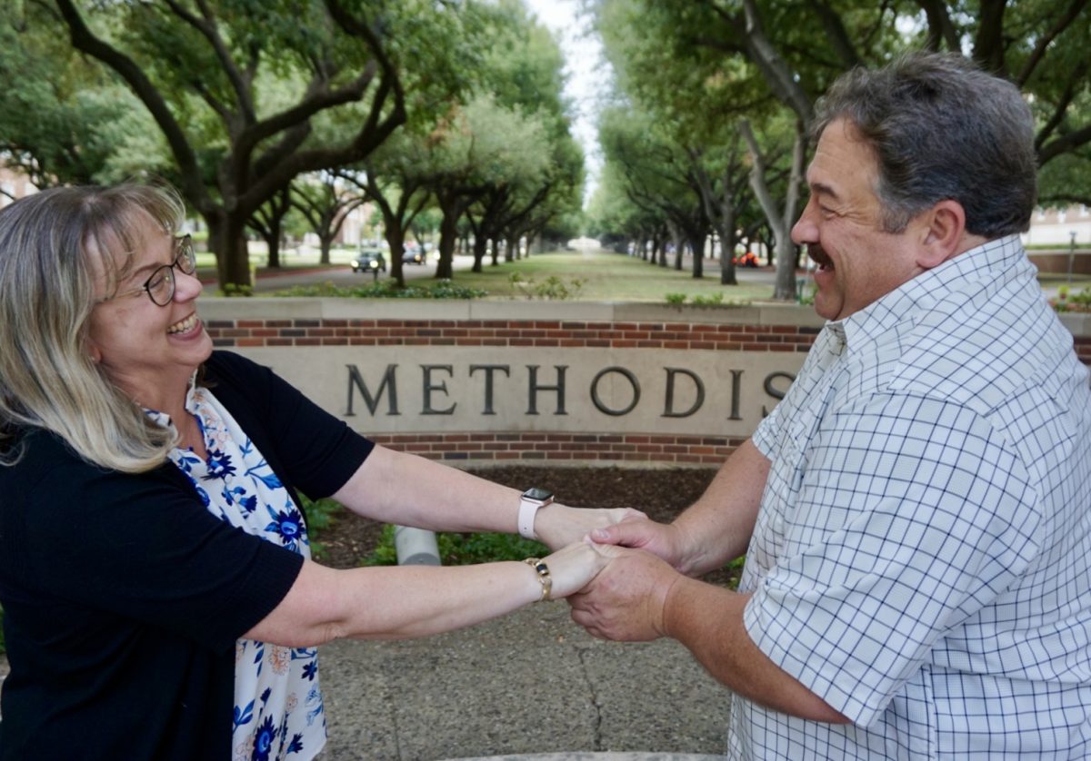 Ken Mattox and Melody Mattox hold hands in celebration of their 30th year anniversary at the place they were proposed to.