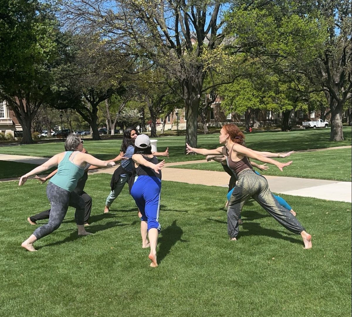 Time Lapse Dance prides in implementing ecology into their choreography. In this image, the dancers are demonstrating the connectedness that both humans and nature experience.
